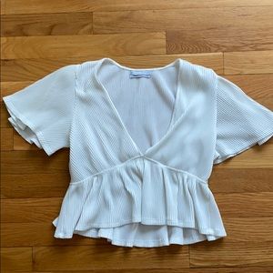 Urban Outfitters Deep V neck peplum top